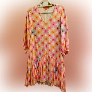 Mini dress flounce Hem. 3/4 sleeve. V neck. Lined